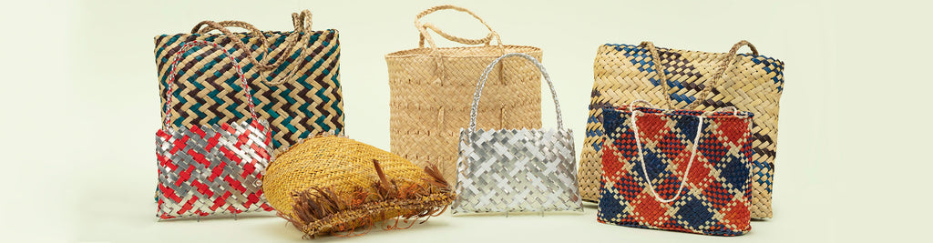 An image showing a range of woven kete available for purchase at Auckland Museum’s store, using materials including harakeke (flax) and aluminium by a range of New Zealand weavers and artists
