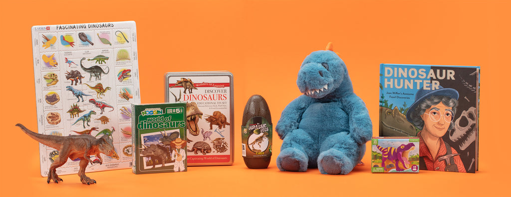 Photograph showing a range of dinosaur products for sale at Auckland Museum Store including soft toy, puzzle and book