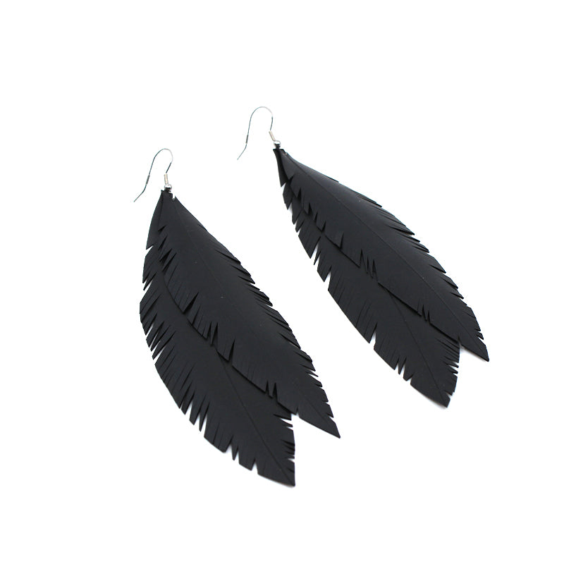 Up-cycled Double Feather Earrings hand made by Ronja Schipper. Worn by New Zealand Prime Minister Jacinda Ardern.